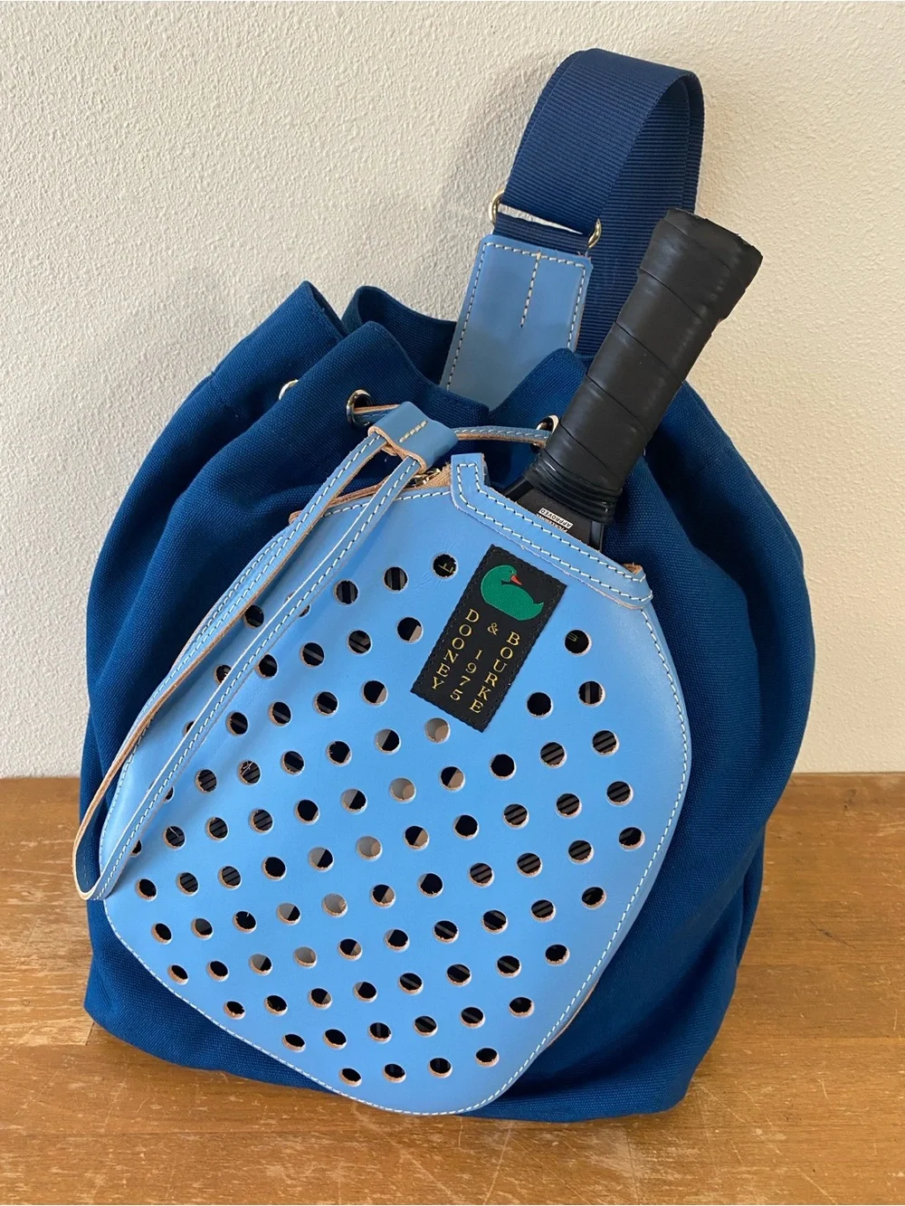 Dooney and Bourke Pickleball Sling Bag French Blue Leather and Canvas